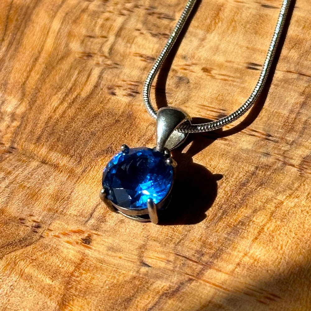 VINTAGE 925 Sterling Silver Swiss Blue Topaz Pendant. Round solitaire pendant